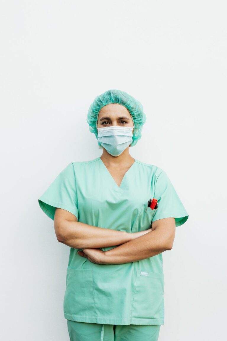 Woman Wearing a Scrub Suit Standing with Arms Crossed